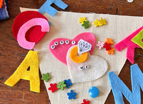 Felt and fabric laid out on a worktable for a hen party creative bunting workshop