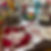 A selection of threads, sequins, fabric and vintage haberdashery laid out on a table for a creative workshop