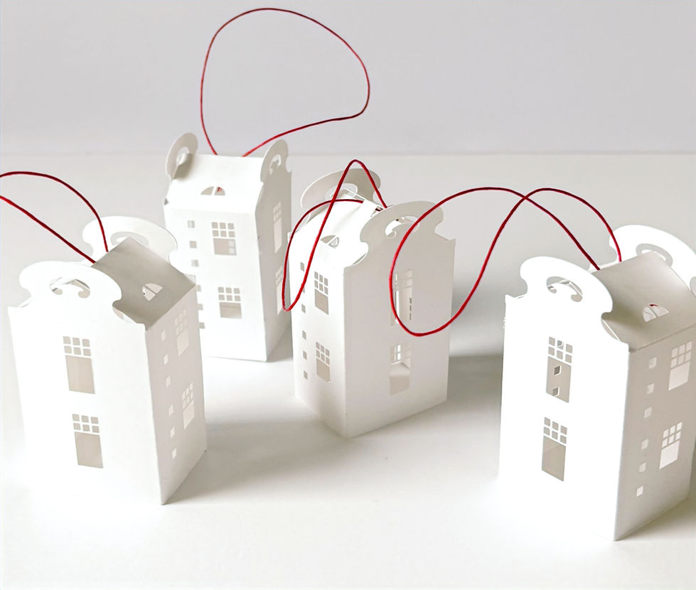 Hanging mini houses with red hanging string
