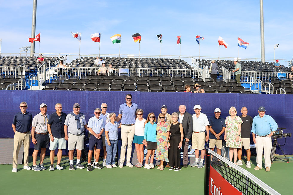 8/26/2026 John Isner inducted into the NC Tennis Hall of Fame surrounded by 19 NC Tennis Legends (Left to right) Mark Dillon, Don Flow, Andy Avram, Herb Bolick, Jim Corn, Keith Richardson, Janet Moseley, John Isner, Lindsey Linker, Susie Wall, Paula Hale, Rebel Good, Vicki Everette, JW Isenhour, Billy Trott, Jeff Joyce, Bonnie Vandegrift, Allen Farfour, and Cy King