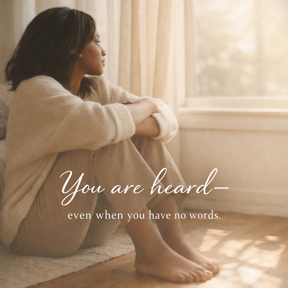 A young woman with soft curly hair sits quietly by a sunlit window, wrapped in warm neutral tones, looking thoughtful and at peace. Gentle light fills the room, creating a calm, reflective atmosphere. Overlaid text reads: “You are heard—even when you have no words."