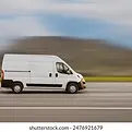 cargo-van-driving-on-highway-260nw-2476921679.webp