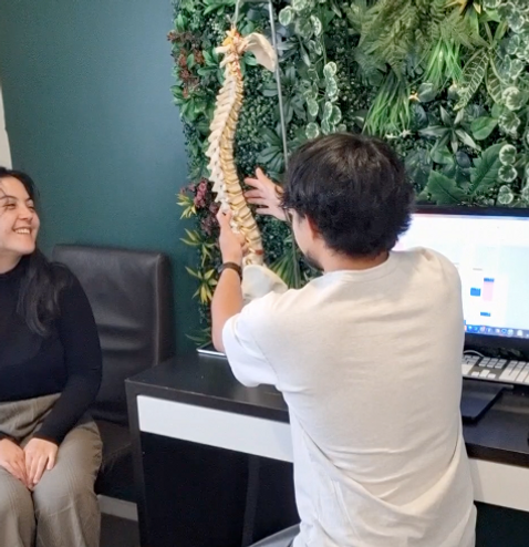 Dr Daniel at health wise chiropractic sunbury office new patient consultation being perfor