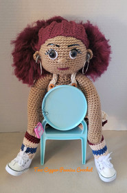 GIrl listening to music two copper pennies crochet dolls.jpeg
