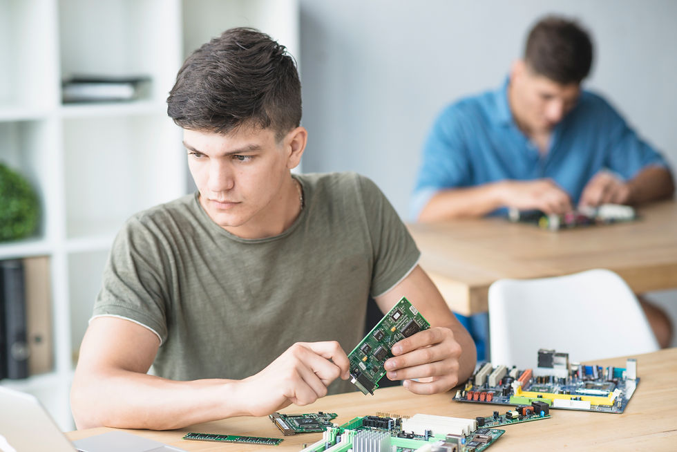 young-it-student-practicing-hardware-equipment-s-workbench.jpg