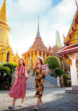 Friends exploring landmarks in a foreign country