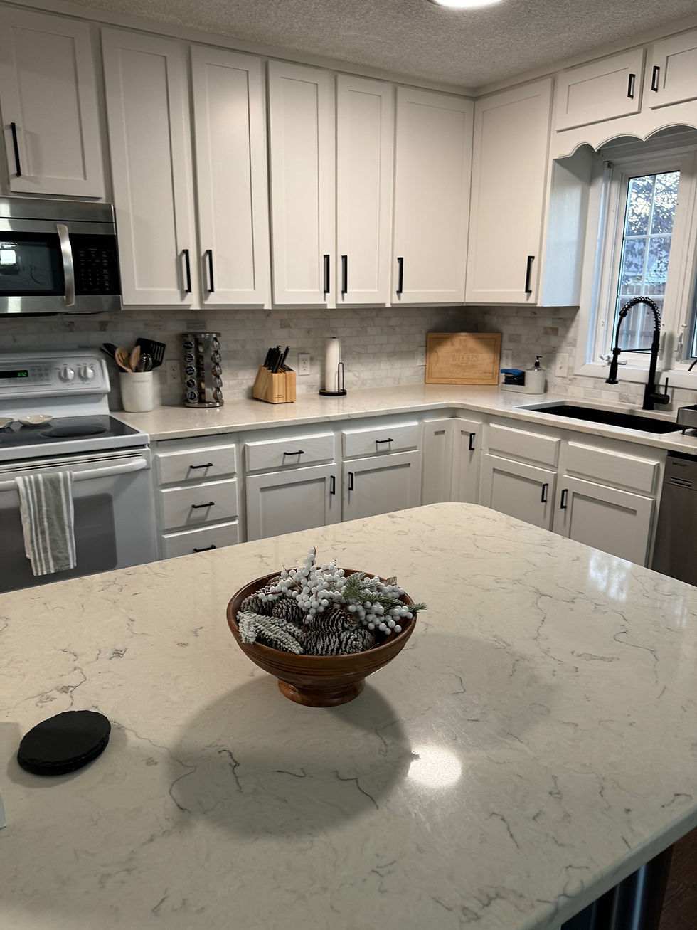 Eye-level view of freshly painted kitchen cabinets
