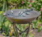 Bronze birdbath with two birds