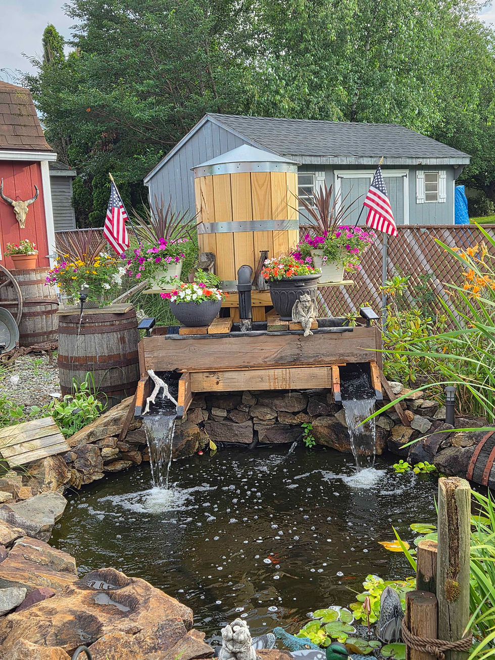 Thumbnail: Metal Only -4 ft. Garden Water Tower Small as a pond feature