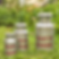 Group photo of farm, fresh galvanized, old style mill can planters