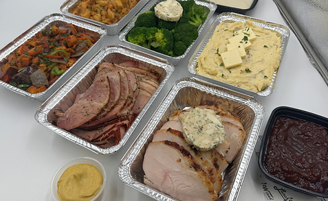 Lunch wired holiday menu items featuring roasted trucket, galzed ham, stuffinf, mashed potatoesm butter broccoli, roashed hash and latkes 