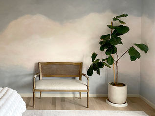 Cloud mural I painted for a primary bathroom.