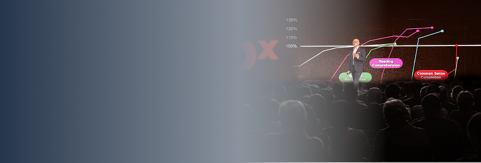 Alex on stage at TedX.png