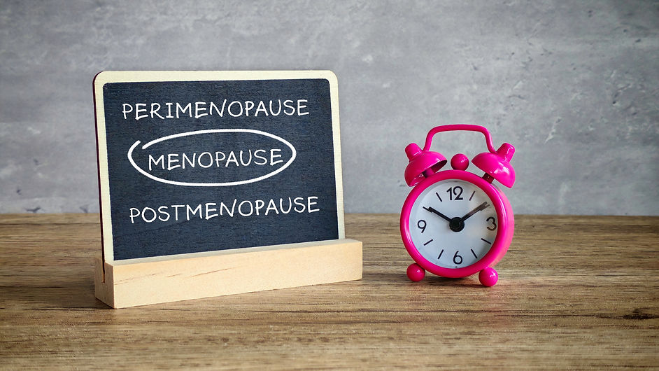 Menopause Cycle Diagram on Chalkboard with Alarm Clock, Illustrating Perimenopause, Menopa
