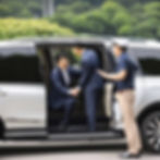 chauffeur opening suv door to chinese client.jpg