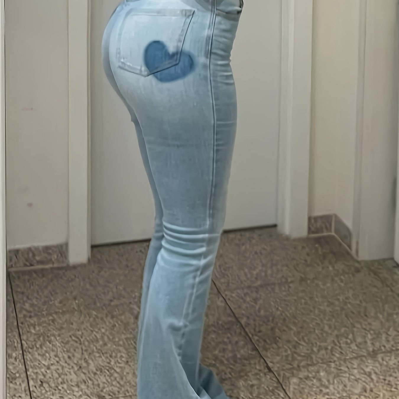 Stylish High-Quality Blue Denim Women's Jeans with Flared Leg Design and Heart-S