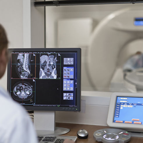 Doctor Operating CT Scanner_edited.jpg
