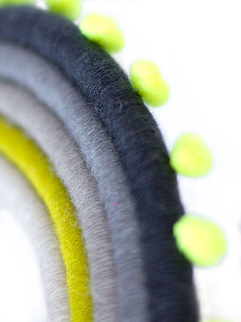 Grey, navy and lime rainbow with neon pom poms, wall hanging, fibre art