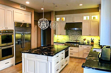 white cabinet shaker doors with black countertops