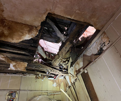 Deteriorated 2nd floor framing in a bathroom
