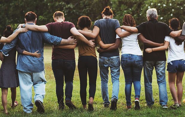 Many Poeple Walking With Eachother with backs faces towards user
