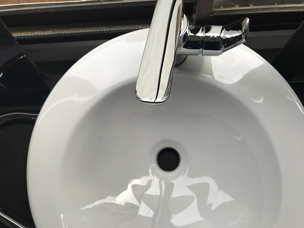 A sink showing the drain.