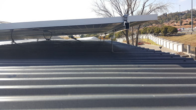PV installation_raised panels flat roof.