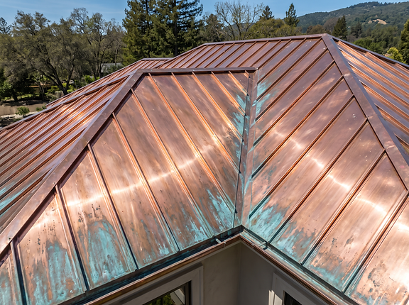 Copper roofing accent detail on a residential roofline