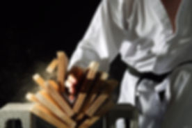 Blackbelt Breaking a Stack of Boards