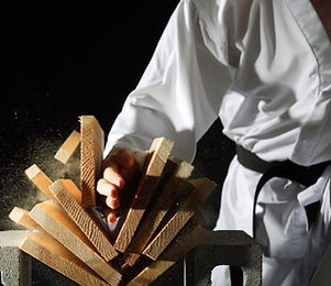 Blackbelt Breaking a Stack of Boards