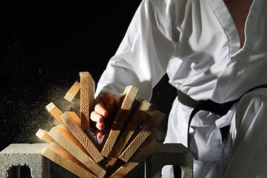 Blackbelt Breaking a Stack of Boards