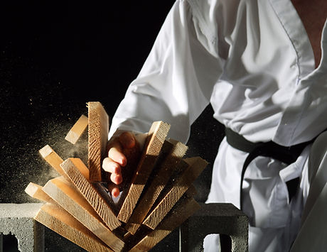 Blackbelt Breaking a Stack of Boards