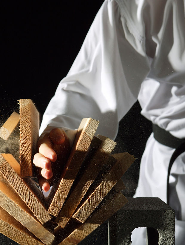 Blackbelt Breaking a Stack of Boards