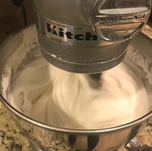 How can I tell when my frosting consistency is perfect?