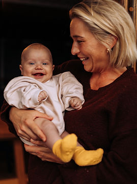 Motherhood photo of woman holding her babyand smiling, taken by Stills by JP, Sutherland Shire photographer