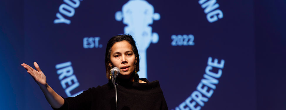 Rhiannon Giddens delivering the 2025 Keynote Address.