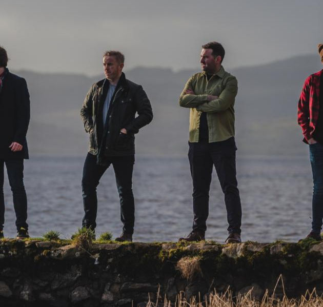 The Porter Belly’s are a vibrant Irish folk-rock band hailing from Northern Ireland, renowned for their distinctive fusion of traditional Irish instruments with modern rock energy. The group features All-Ireland Fleadh champions Chris Maguire and James McCaffrey, whose mastery of flute, whistle, accordion, banjo, and fiddle infuses the band with authentic Irish sounds. Complementing them are Mark McAloon on vocals, Odhrán Sweeney on keys and vocals, Ryan Muldoon on bass, and Sean Reynolds on drums, each contributing their own unique style to create a rich, dynamic sound.
Together, The Porter Belly’s deliver electrifying full-band performances that captivate audiences and keep them coming back for more. Their appearances at prestigious festivals like the All-Ireland Fleadh, Peat on the Beat, Galway Bay Festival, Joe Mooney Summer School, O’Carolan Harp Festival, and Folk the World have earned them both loyal fans and critical praise.
What sets The Porter Belly’s apart is their seamless blend of timeless Irish melodies with the raw power of rock music. Their infectious rhythms and heartfelt lyrics resonate across generations, crafting an immersive experience that transports listeners straight to the heart of Ireland. Whether you love traditional folk or rock, The Porter Belly’s offer something unforgettable for everyone.