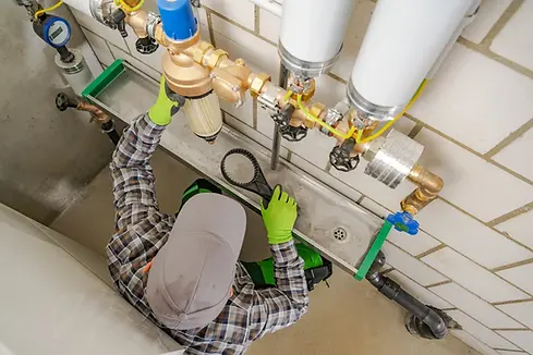 Professional Plumber Working.webp