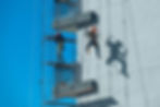 couple-workers-fixing-climbing-scaffolding-while-following-all-safety-measures.jpg