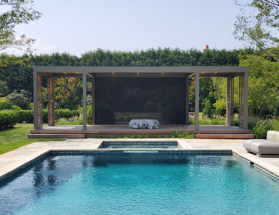 image of a Renson pergola near a pool at a home in the Hamptons.