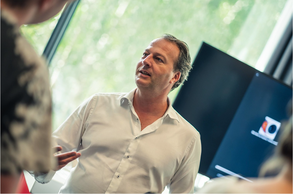 Eye-level view of a business consultant discussing strategies with a startup team