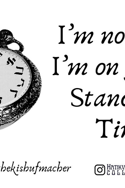 A decorative clock displays the phrase I'm not late, I'm on Jewish Standard Time. The clock features traditional symbols and art.
