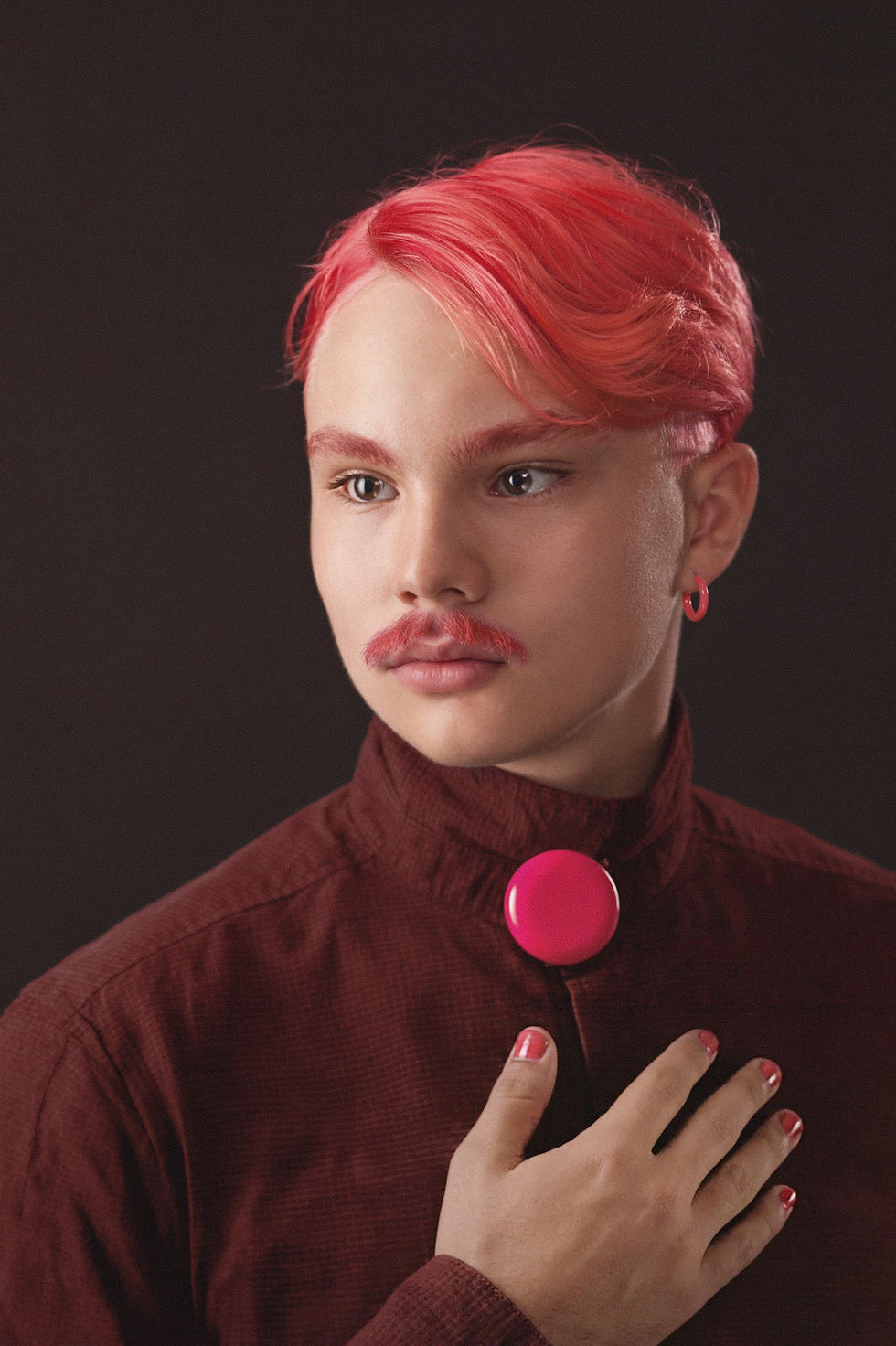 A man with pink hair