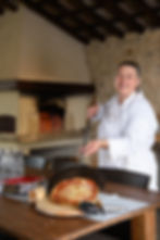 Mara with pizza from our loggia forno