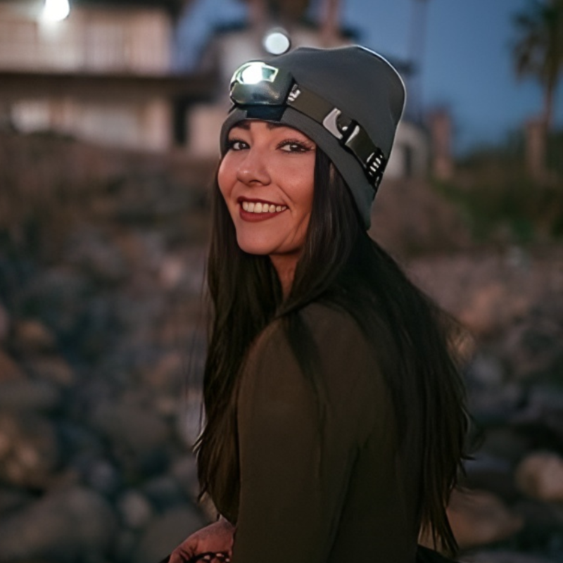 Woman wearing military headlamp