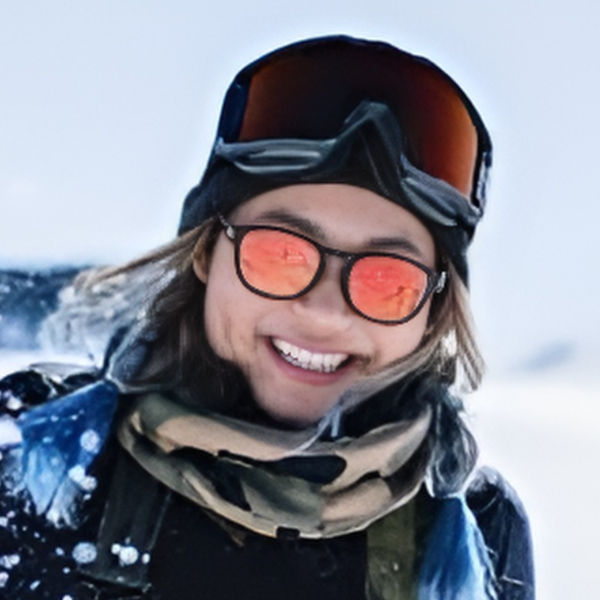 Woman wearing women's Oakley sunglasses and goggles