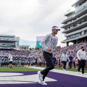 Kansas State head coach Collin Klein jogs off the field ahead of the Wildcats following warmups before K-State’s season opener against Nicholls on Sept. 5, at Bill Snyder Family Stadium in Manhattan. (Ashton Todd)