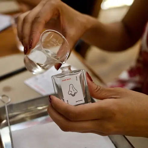 Blend and pour a personalized perfume fragrance at Nose Best.webp