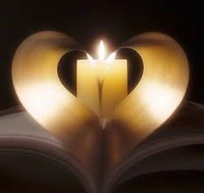 Heart image with a candle on top of a book