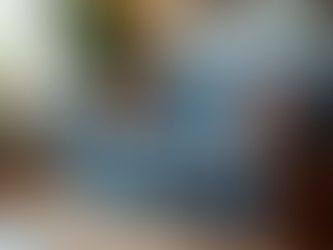 Enhance Your Living Room with a Blue Tribal Printed Sofa Cover and Multicolor Tassels